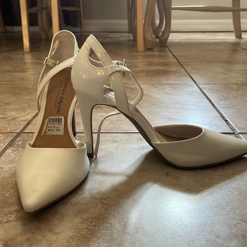 These are white Christian Siriano never worn.